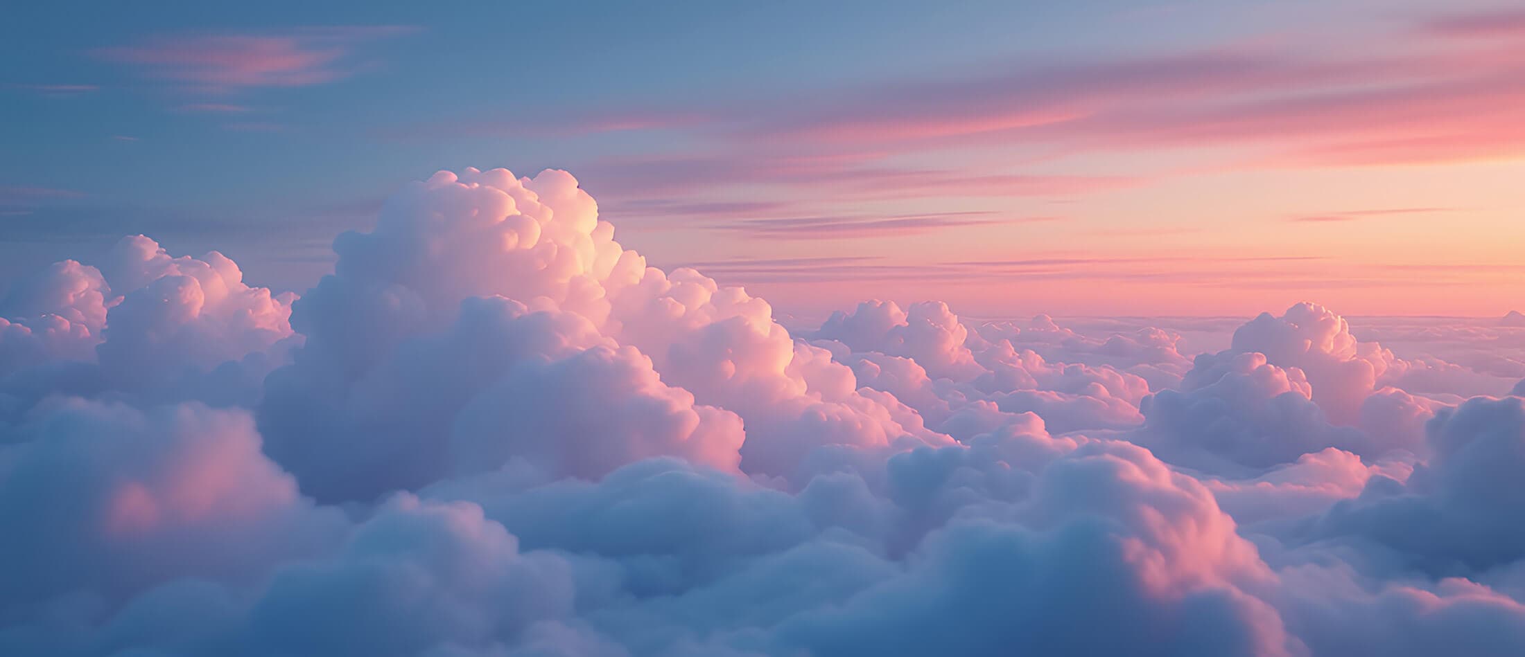 Towering cumulus clouds seen from above at sunset, lit pink and blue, the hero image for Aleta’s guide to local vs. cloud AI models for family offices.